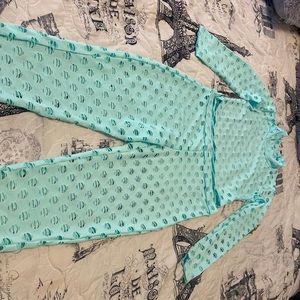 2 Peace top and bottom see-through club woman set. Available and size medium.